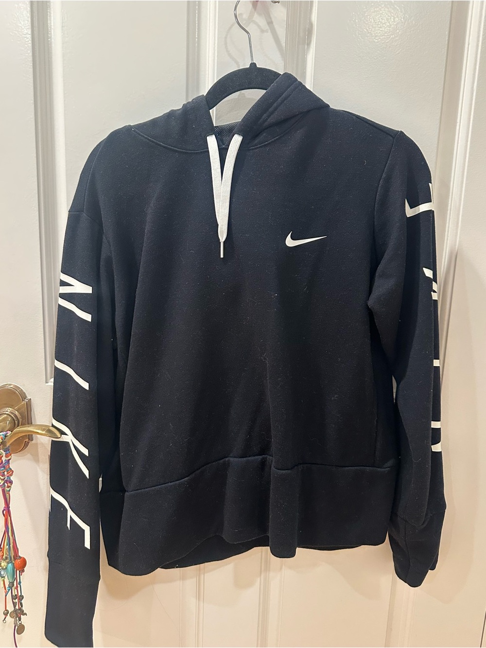 Nike Black Hoodie with White Swoosh and Sleeve Graphics